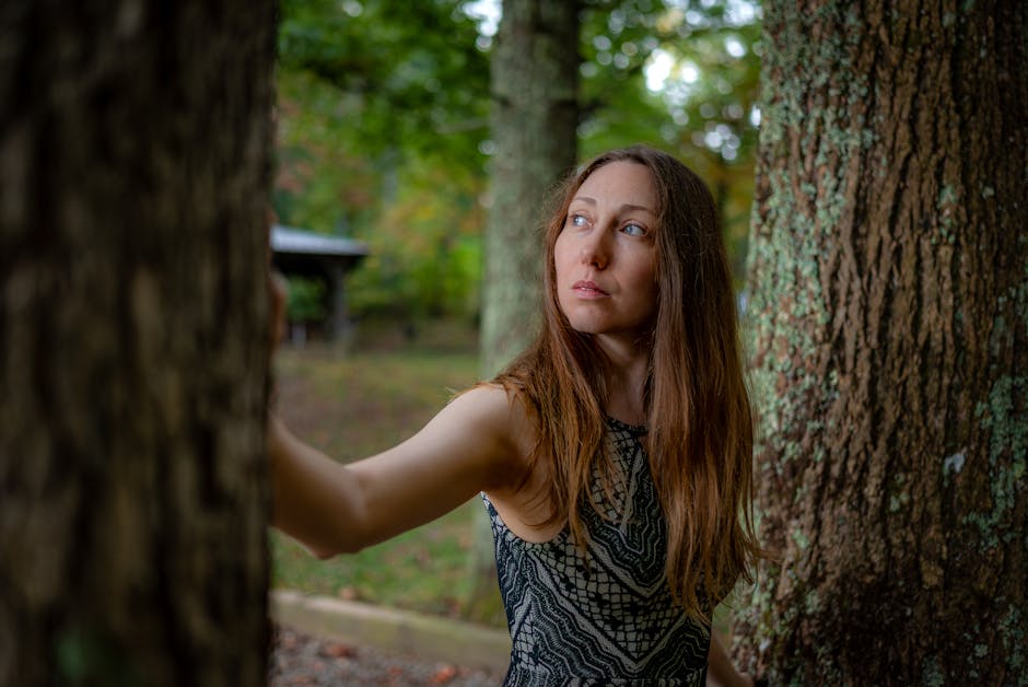 Portrait photographer reviewing final image with client